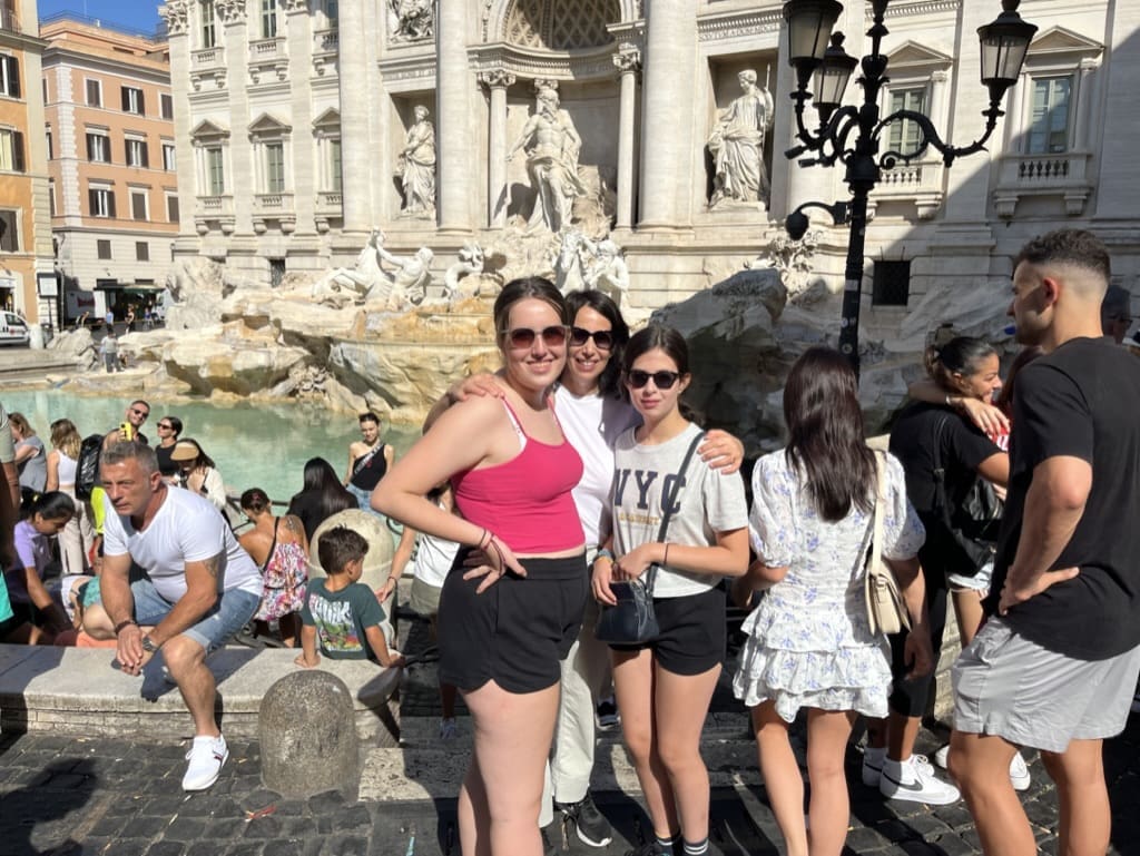 Family photo at the Trevi Fountain in Rome