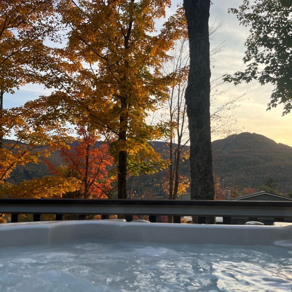 Hot tub on our rental house deck with fall views of Hunter