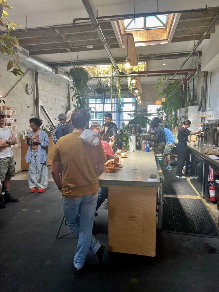 People enjoying their coffee at Yes Cafe Bushwick