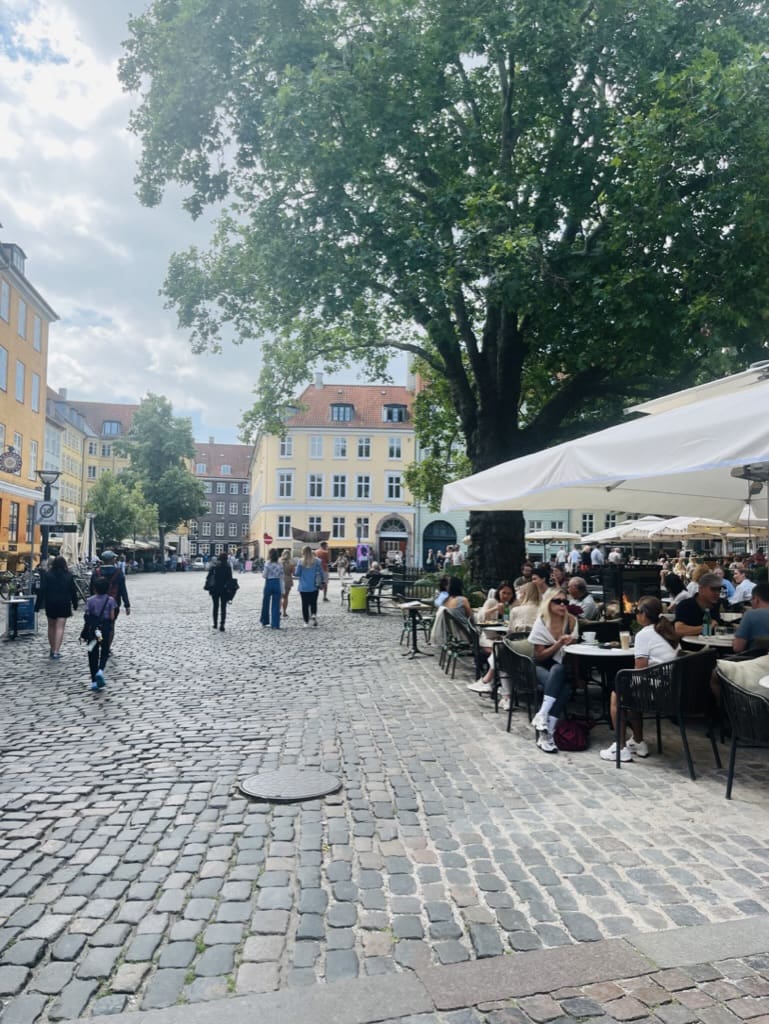 people enjoying lunch at a cafe at Copenhagen old city center